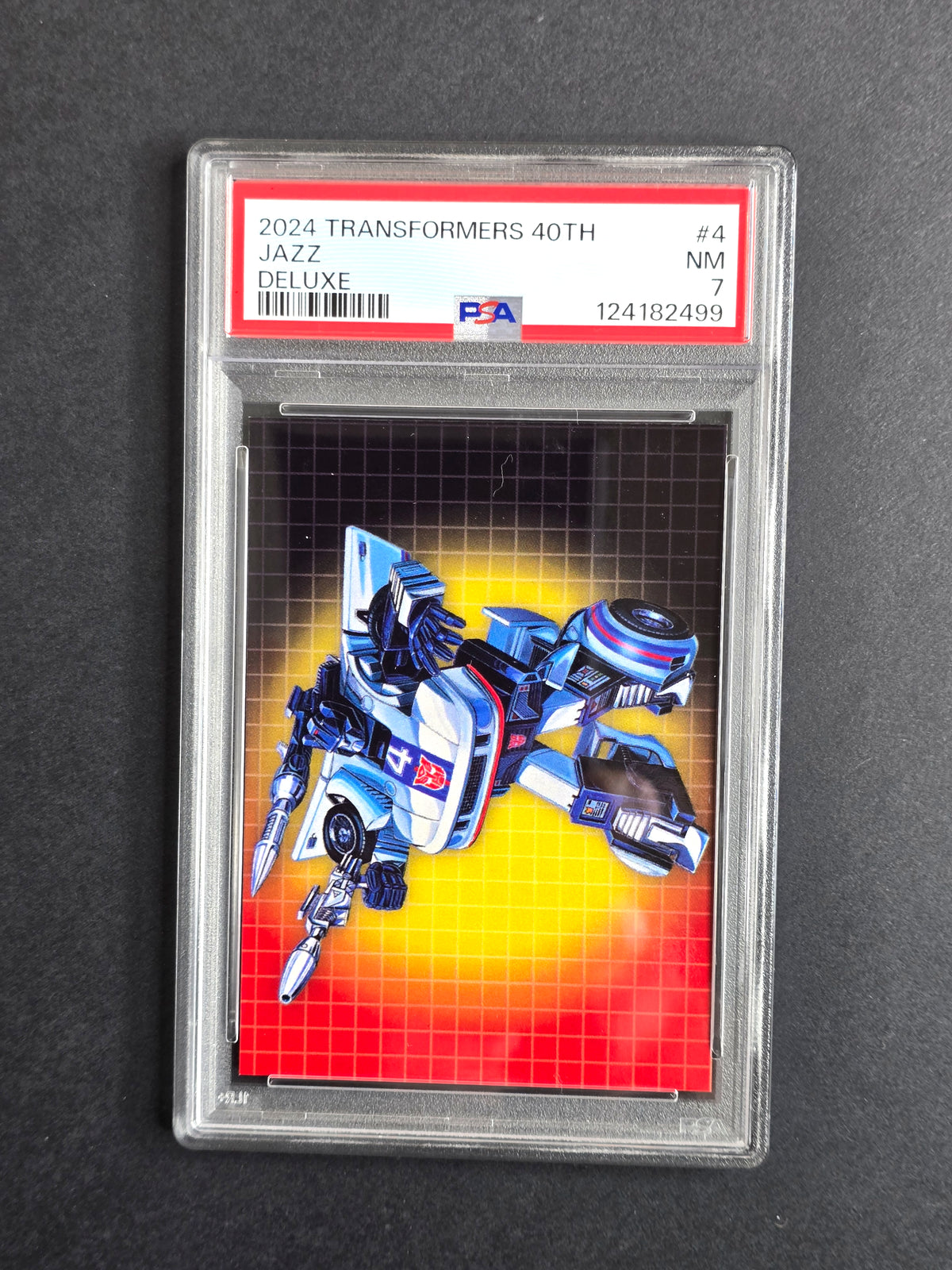 2024 Dynamite Transformers 40th Anniversary Jazz Deluxe #4 – PSA 7 NM Graded Card