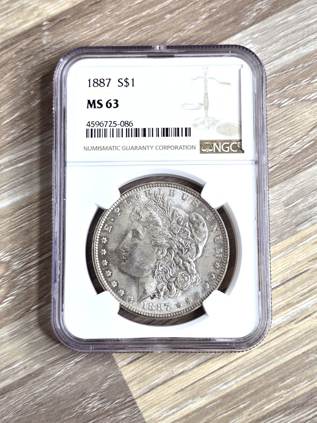 1887 Morgan Silver Dollar NGC MS 63 Grade Mint