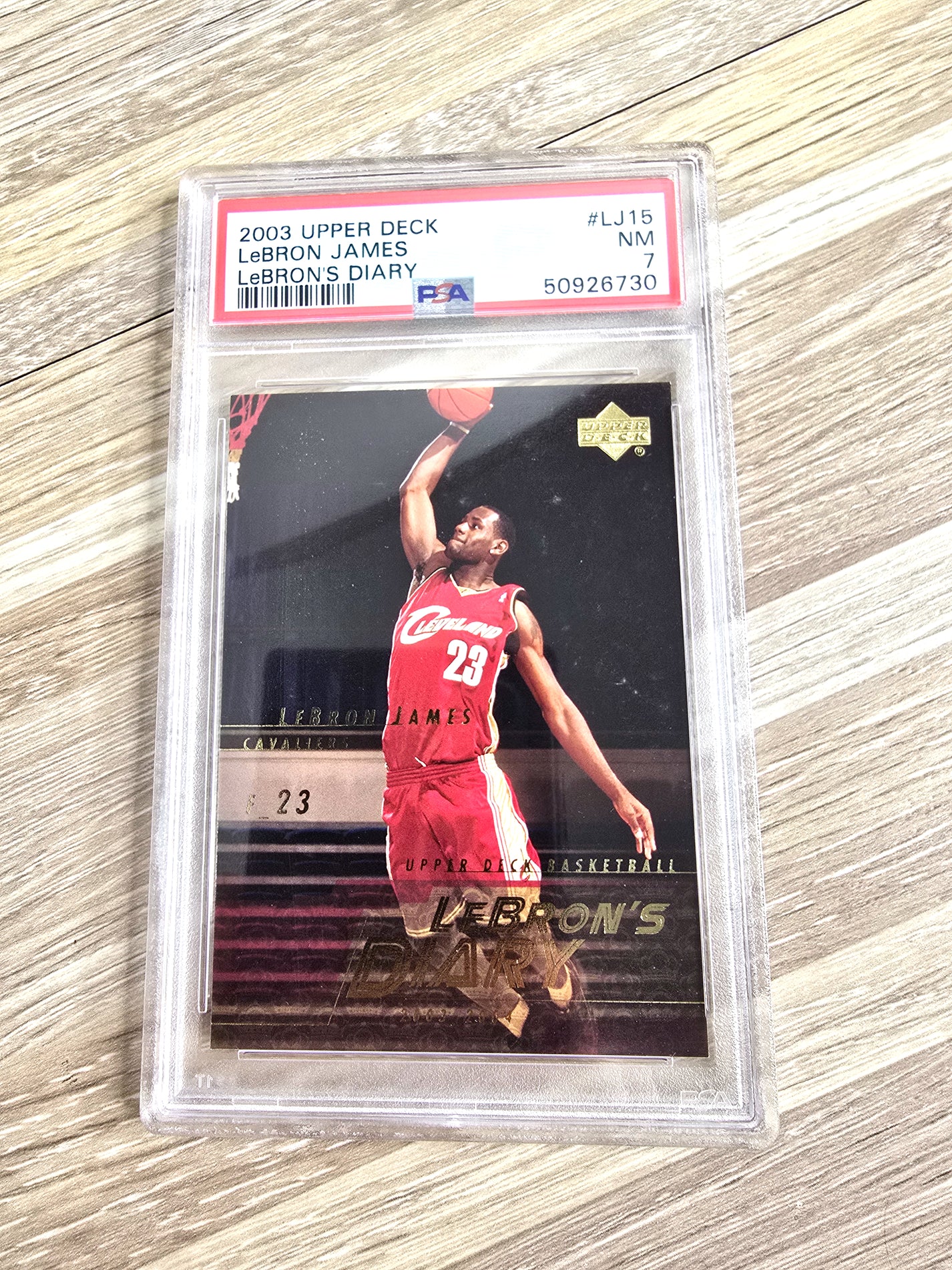 2003 Upper Deck LeBron James Rookie Card (No. LJ15) – PSA 7